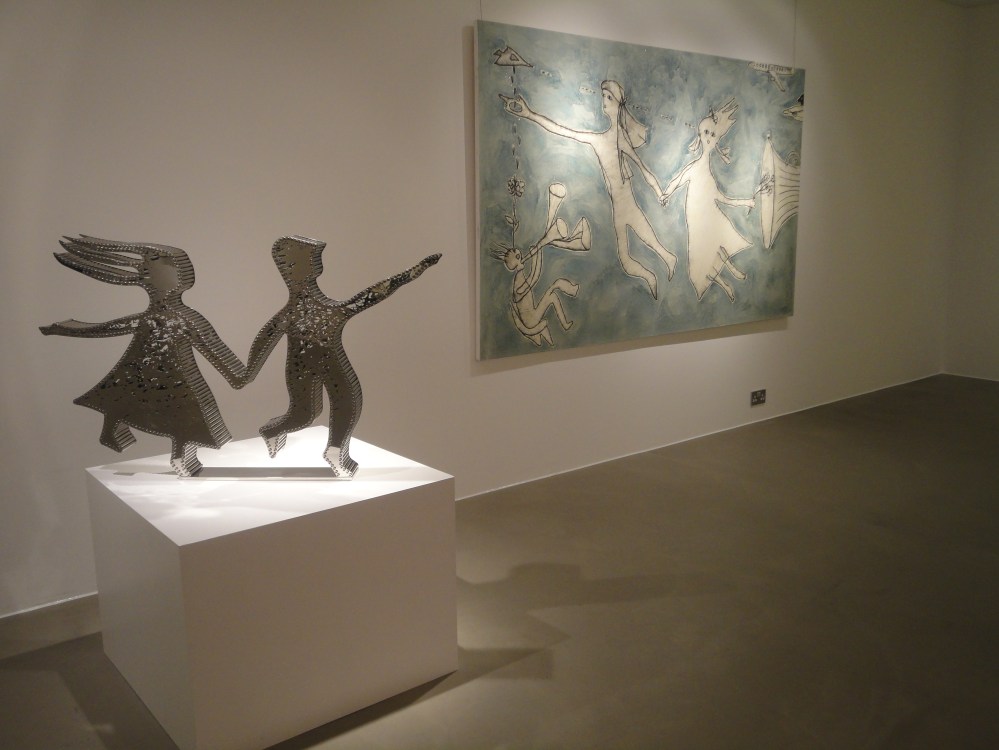 'Couple' Stainless Steel, Super Shiny Finish Sculpture (left) 