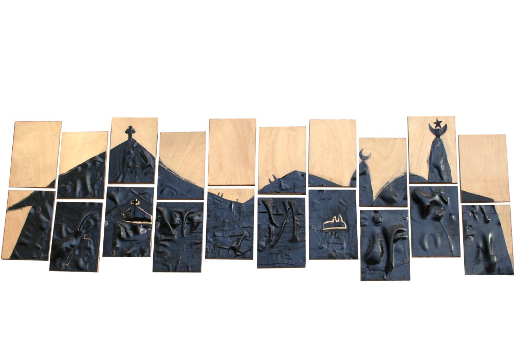 (Marker '13) Henri Sagna 'Un autre monde est possible'. Medium : Rubber and acrylic on wood. Courtesy: Raw Material Company